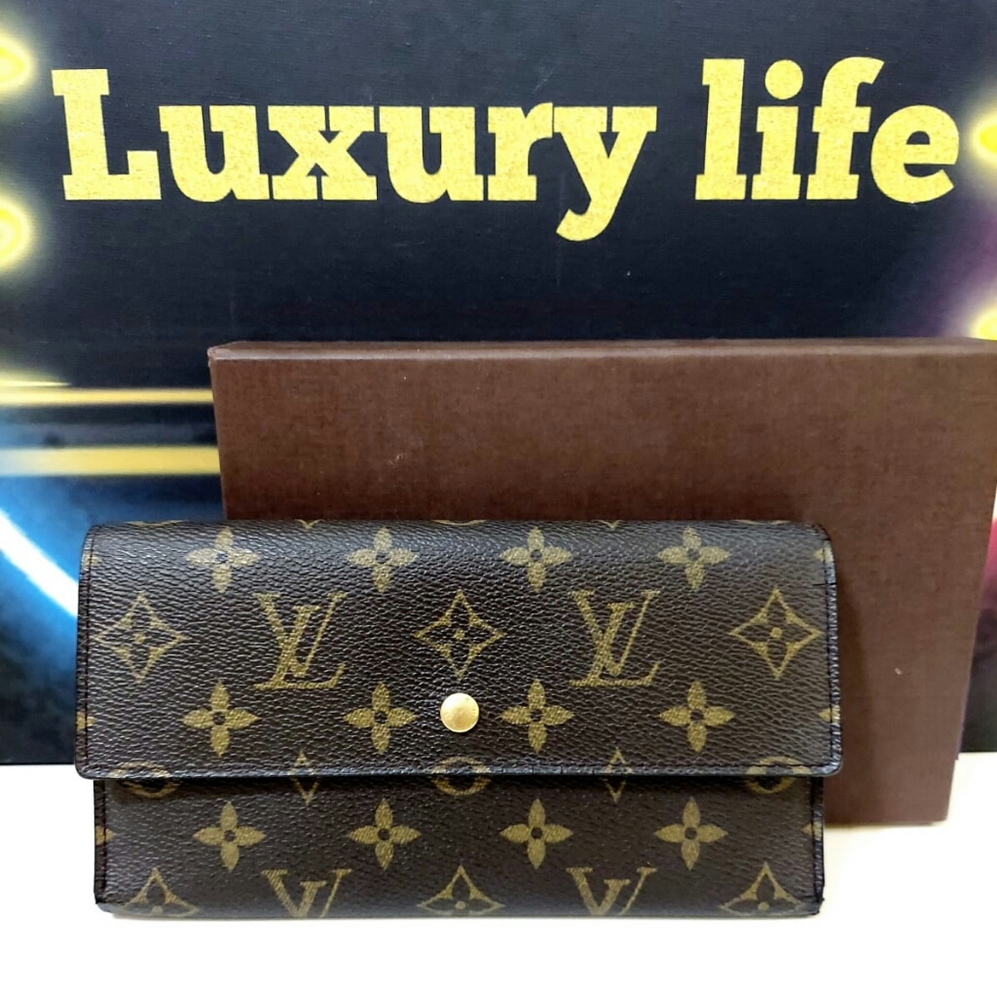 Authentic louis vuitton trifold sarah monogram